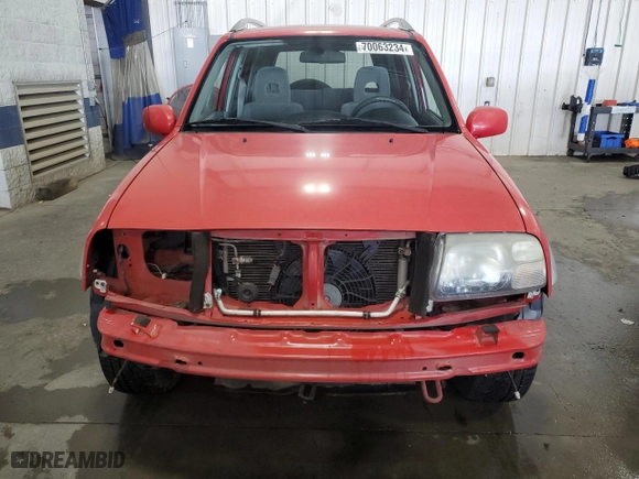 2004 Suzuki Grand Vitara LX with VIN JS3TD62V444101460, listed as a Copart auction lot 70063234 with 113,618 mi miles and Salvage Title. Bid and sale history available at carsss.com. Image 5.