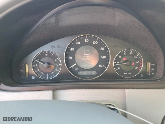2003 Mercedes-Benz CLK-Class 5.0L with VIN WDBTJ75JX3F052823, listed as a Copart auction lot 87321334 with 132,774 mi miles and Salvage Title. Bid and sale history available at carsss.com. Image 9.