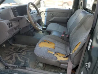 1994 Isuzu Pickup S z VIN JAACL11L2R7221226, wystawiony jako Copart lot #59027295 z przebiegiem 129 494 mil mil oraz Tytuł czysty. Historia ofert i sprzedaży dostępna na DreamBid. Obrazek 7.