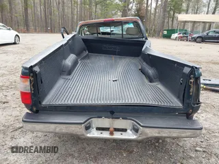 1995 Toyota T100 z VIN JT4VD11E8S0006805, wystawiony jako IAAI lot #41867368 z przebiegiem 261 130 mil mil oraz . Historia ofert i sprzedaży dostępna na DreamBid. Obrazek 17.