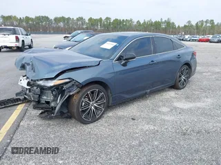 2022 Toyota Avalon Touring z VIN 4T1HZ1FB3NU088304, wystawiony jako IAAI lot #36419998 z przebiegiem 14 956 mil mil oraz . Historia ofert i sprzedaży dostępna na DreamBid. Obrazek 2.