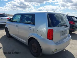 2009 Scion xB with VIN JTLKE50E991081756, listed as a IAAI auction lot 41952232 with 167,079 mi miles. Bid and sale history available at carsss.com. Image 3.