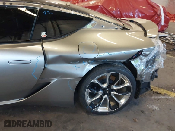 2019 Lexus LC 500h z VIN JTHHP5AY2KA006295, wystawiony jako IAAI lot #41663648 z przebiegiem 38 483 mil mil oraz . Historia ofert i sprzedaży dostępna na DreamBid. Obrazek 18.
