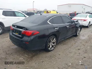 2015 Infiniti Q70 with VIN JN1BY1AR9FM561113, listed as a IAAI auction lot 41541936 with 266,227 mi miles and . Bid and sale history available at DreamBid. Image 4.