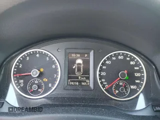2013 Volkswagen Tiguan S z VIN WVGBV3AX6DW611477, wystawiony jako Copart lot #82567264 z przebiegiem 139 210 mil mil oraz Szkoda całkowita • Salvage title. Historia ofert i sprzedaży dostępna na DreamBid. Obrazek 9.