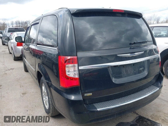 2013 Chrysler Town & Country Touring with VIN 2C4RC1BG5DR554662, listed as a IAAI auction lot 41833006 with 143,626 mi miles and . Bid and sale history available at DreamBid. Image 3.