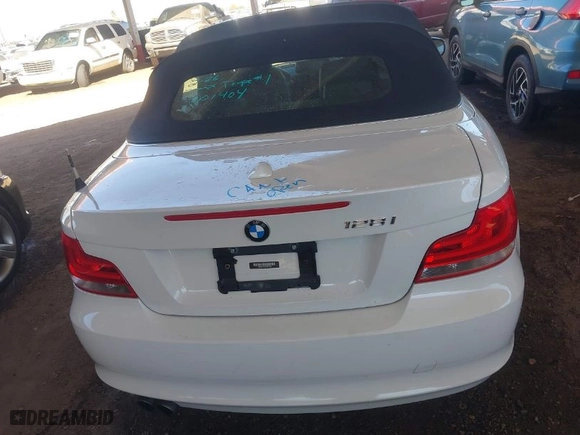2013 BMW 1 Series 128i with VIN WBAUN1C55DVR01404, listed as a IAAI auction lot 41682695 with 100,948 mi miles. Bid and sale history available at carsss.com. Image 16.