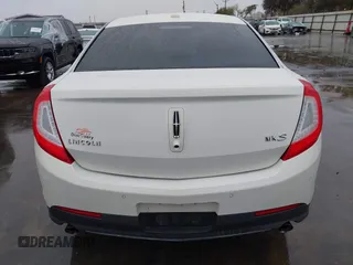 2013 Lincoln MKS with VIN 1LNHL9DK4DG605058, listed as a IAAI auction lot 41068489 with 101,801 mi miles. Bid and sale history available at carsss.com. Image 17.