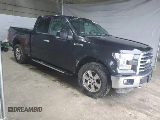 2015 Ford F-150 XLT with VIN 1FTFX1EF9FKD86097, listed as a Copart auction lot 55771465 with 152,026 mi miles and Salvage title. Bid and sale history available at DreamBid. Image 4.