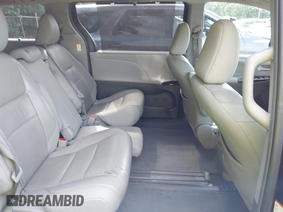 2015 Toyota Sienna XLE with VIN 5TDYK3DC8FS574645, listed as a IAAI auction lot 42528851 with 164,408 mi miles and . Bid and sale history available at DreamBid. Image 8.