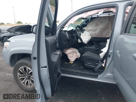 2021 Toyota Tacoma SR with VIN 3TMCZ5AN2MM405869, listed as a IAAI auction lot 42094533 with 78,449 mi miles and . Bid and sale history available at DreamBid. Image 5.