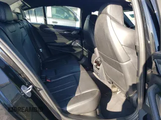 2018 BMW M5 z VIN WBSJF0C5XJB282107, wystawiony jako Copart lot #49979943 z przebiegiem 55 243 mil mil oraz . Historia ofert i sprzedaży dostępna na DreamBid. Obrazek 10.