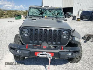 2020 Jeep Wrangler Unlimited Rubicon with VIN 1C4HJXFG4LW334160, listed as a Copart auction lot 59486435 with Not provided miles and Salvage title. Bid and sale history available at DreamBid. Image 5.