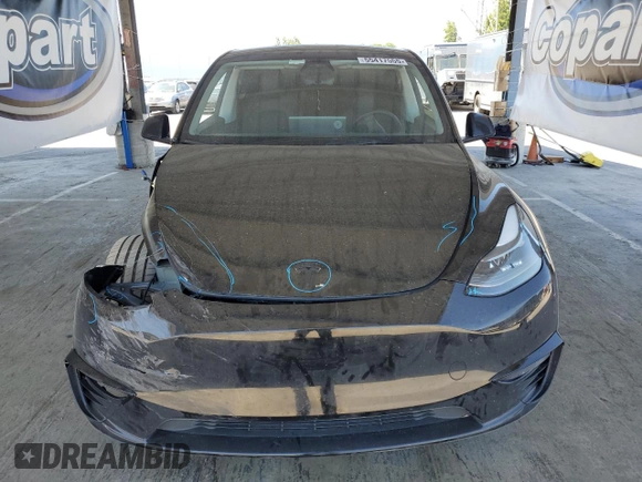 2024 Tesla Model Y Long Range с VIN 7SAYGDEE8RF983280, выставлен на аукционе Copart как лот 55417555 с пробегом 52 273 миль миль и Списание • Salvage title. История ставок и продаж доступна на DreamBid. Изображение 5.
