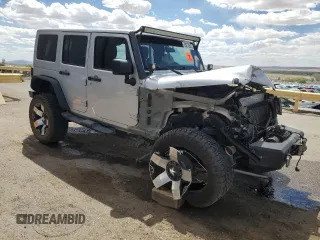 2012 Jeep Wrangler Unlimited Altitude with VIN 1C4HJWEG8CL163653, listed as a Copart auction lot 55279045 with 107,076 mi miles and Salvage title. Bid and sale history available at DreamBid. Image 4.