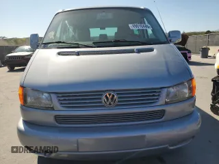 2002 Volkswagen EuroVan с VIN WV2KB47012H065431, выставлен на аукционе Copart как лот 49010445 с пробегом 78 985 миль миль и Чистый • Clean title. История ставок и продаж доступна на DreamBid. Изображение 5.