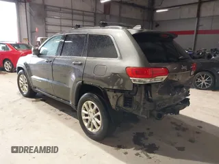 2014 Jeep Grand Cherokee Laredo with VIN 1C4RJEAG7EC145023, listed as a IAAI auction lot 40518825 with 115,098 mi miles and . Bid and sale history available at DreamBid. Image 3.