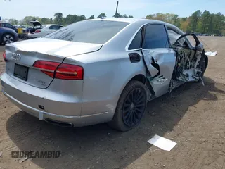 2015 Audi A8 4.0T z VIN WAU32AFD2FN038880, wystawiony jako IAAI lot #42138932 z przebiegiem 102 968 mil mil oraz . Historia ofert i sprzedaży dostępna na DreamBid. Obrazek 4.