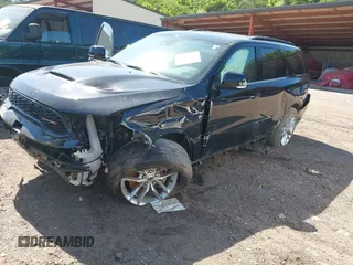 2023 Dodge Durango R/T Plus with VIN 1C4SDHCT0PC549899, listed as a IAAI auction lot 42322151 with 81,722 mi miles and . Bid and sale history available at DreamBid. Image 2.