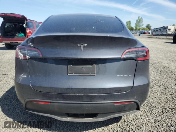 2022 Tesla Model Y Long Range z VIN 7SAYGDEE5NF367885, wystawiony jako Copart lot #52944795 z przebiegiem Nie podano mil oraz Szkoda całkowita • Salvage title. Historia ofert i sprzedaży dostępna na DreamBid. Obrazek 6.