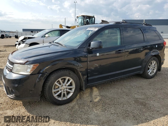 2015 Dodge Journey SXT with VIN 3C4PDCCG5FT559021, listed as a Copart auction lot 60101335 with 323,930 mi miles and Salvage title. Bid and sale history available at DreamBid. Image 1.