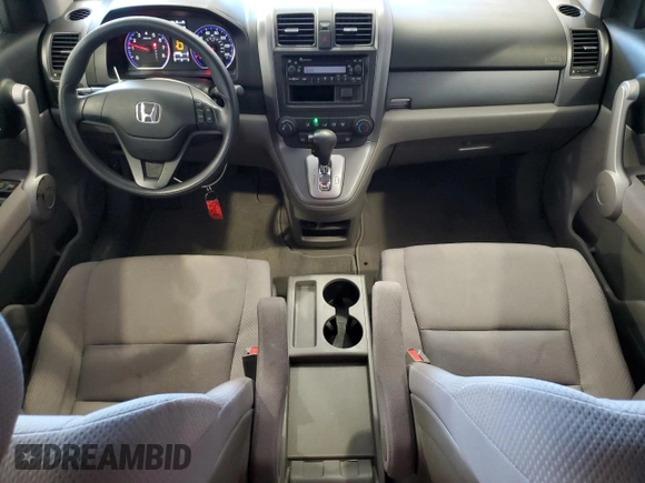 2007 Honda CR-V LX z VIN JHLRE383X7C040333, wystawiony jako Copart lot #57895475 z przebiegiem 124 156 mil mil oraz Szkoda całkowita • Salvage title. Historia ofert i sprzedaży dostępna na DreamBid. Obrazek 8.
