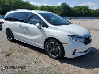 2022 Honda Odyssey Elite with VIN 5FNRL6H91NB022604, listed as a Copart auction lot 60165615 with 51,557 mi miles and Salvage title. Bid and sale history available at DreamBid. Image 4.