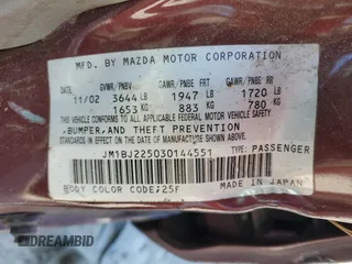 2003 Mazda Protege DX with VIN JM1BJ225030144551, listed as a Copart auction lot 50769905 with 179,876 mi miles and Salvage Title. Bid and sale history available at DreamBid. Image 14.