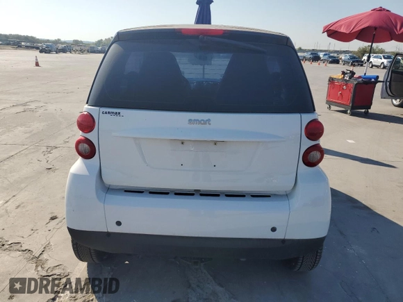 2012 Smart fortwo Pure z VIN WMEEJ3BA5CK540092, wystawiony jako Copart lot #75701964 z przebiegiem 59 355 mil mil oraz Szkody całkowita. Historia ofert i sprzedaży dostępna na DreamBid. Obrazek 6.