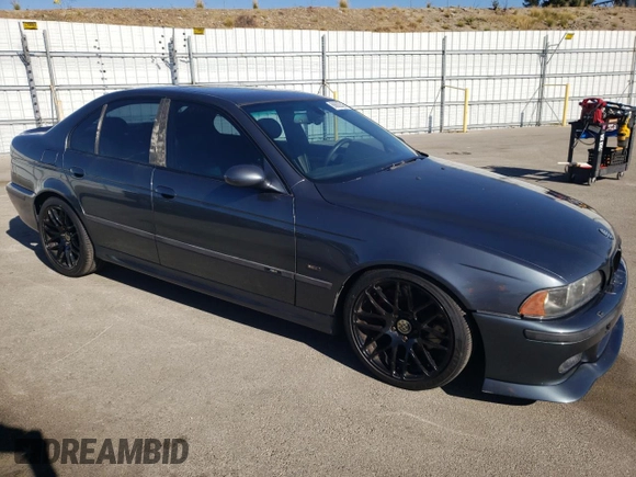 2000 BMW M5 z VIN WBSDE9349YBZ94615, wystawiony jako Copart lot #88802245 z przebiegiem 157 774 mil mil oraz Tytuł czysty. Historia ofert i sprzedaży dostępna na DreamBid. Obrazek 4.