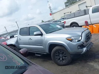2023 Toyota Tacoma SR with VIN 3TYCZ5AN2PT176554, listed as a IAAI auction lot 42148651 with 15,255 mi miles and . Bid and sale history available at DreamBid. Image 13.