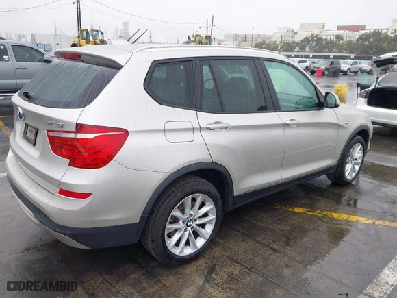 2015 BMW X3 sDrive28i with VIN 5UXWZ7C57F0F76274, listed as a IAAI auction lot 41479655 with 116,929 mi miles. Bid and sale history available at carsss.com. Image 4.