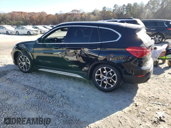 2022 BMW X1 sDrive28i with VIN WBXJG7C03N5V16273, listed as a Copart auction lot 83842324 with 19,303 mi miles and Salvage Title. Bid and sale history available at carsss.com. Image 2.