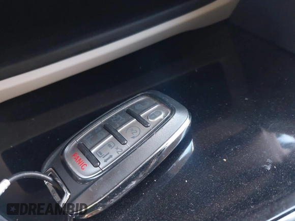 2023 Chrysler Pacifica Hybrid Limited with VIN 2C4RC1S72PR588627, listed as a IAAI auction lot 42063631 with 52,799 mi miles and . Bid and sale history available at DreamBid. Image 11.