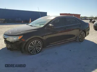 2014 Toyota Camry L with VIN 4T4BF1FK2ER376447, listed as a Copart auction lot 82886974 with 112,833 mi miles and Salvage Title. Bid and sale history available at DreamBid. Image 1.