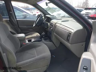 2001 Jeep Grand Cherokee Laredo with VIN 1J4GW48S51C739725, listed as a IAAI auction lot 41800431 with 220,396 mi miles. Bid and sale history available at carsss.com. Image 5.