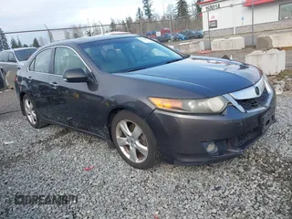 2009 Acura TSX with VIN JH4CU26689C029183, listed as a IAAI auction lot 41752509 with 169,872 mi miles. Bid and sale history available at carsss.com. Image 1.