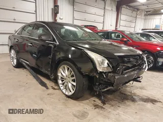 2014 Cadillac XTS Platinum with VIN 2G61W5S88E9186969, listed as a IAAI auction lot 41422872 with 184,998 mi miles and . Bid and sale history available at DreamBid. Image 1.