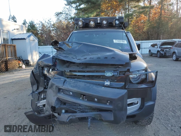 2023 Land Rover Defender S with VIN SALEJ7EX3P2121582, listed as a Copart auction lot 77433164 with 26,507 mi miles and Salvage title. Bid and sale history available at DreamBid. Image 5.