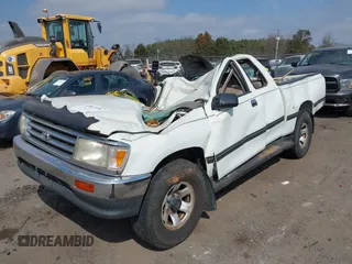1997 Toyota T100 DX with VIN JT4UN22D9V0047212, listed as a IAAI auction lot 41801996 with 77,524 mi miles. Bid and sale history available at carsss.com. Image 2.