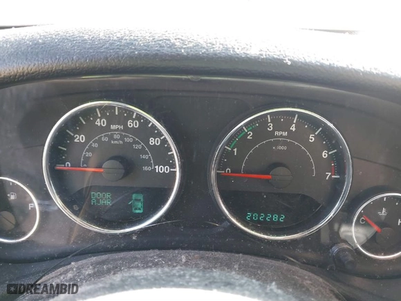 2012 Jeep Wrangler Unlimited Sport with VIN 1C4BJWDG5CL209978, listed as a IAAI auction lot 41662081 with 202,282 mi miles. Bid and sale history available at carsss.com. Image 7.