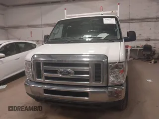 2012 Ford Econoline Cargo Recreational with VIN 1FTNE2EW4CDB03757, listed as a IAAI auction lot 42072612 with 147,153 mi miles. Bid and sale history available at carsss.com. Image 12.