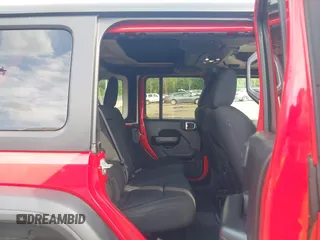 2020 Jeep Wrangler Unlimited Freedom with VIN 1C4HJXDG5LW282721, listed as a IAAI auction lot 42268956 with 47,245 mi miles and . Bid and sale history available at DreamBid. Image 8.