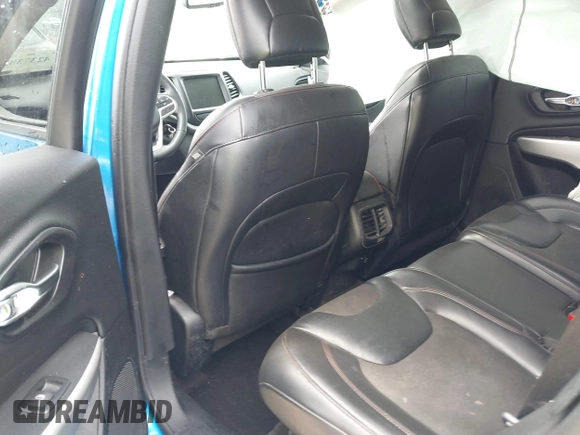 2017 Jeep Cherokee Trailhawk with VIN 1C4PJMBS2HW612792, listed as a IAAI auction lot 42373828 with 74,106 mi miles and . Bid and sale history available at DreamBid. Image 8.
