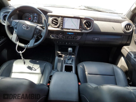2023 Toyota Tacoma SR with VIN 3TMCZ5AN3PM571922, listed as a Copart auction lot 61872775 with 34,501 mi miles and Salvage title. Bid and sale history available at DreamBid. Image 8.