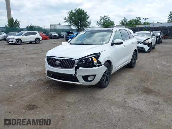 2018 Kia Sorento SX Limited with VIN 5XYPKDA55JG429852, listed as a IAAI auction lot 42823592 with 84,317 mi miles and . Bid and sale history available at DreamBid. Image 2.