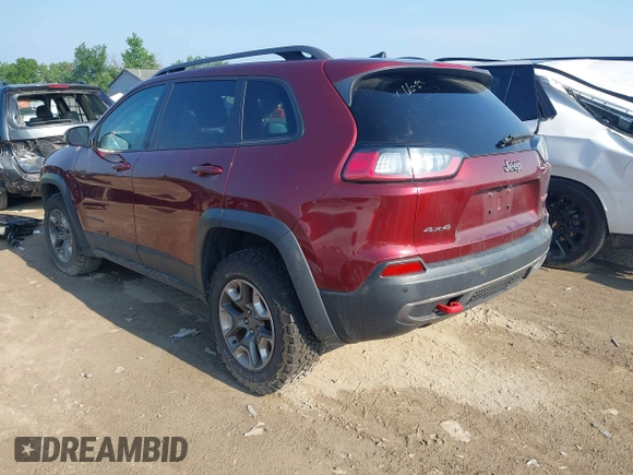 2019 Jeep Cherokee Trailhawk with VIN 1C4PJMBX5KD421043, listed as a IAAI auction lot 42570336 with 114,463 mi miles and . Bid and sale history available at DreamBid. Image 3.