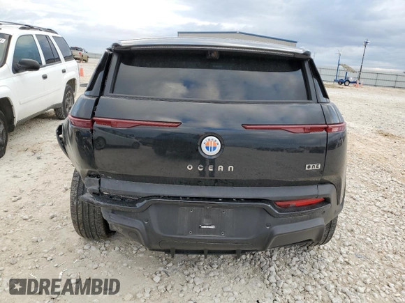 2023 Fisker Ocean One z VIN VCF1ZBU21PG005825, wystawiony jako Copart lot #85688444 z przebiegiem 12 331 mil mil oraz Szkody całkowita. Historia ofert i sprzedaży dostępna na DreamBid. Obrazek 6.