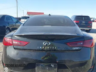 2022 Infiniti Q60 Red Sport 400 with VIN JN1FV7LK0NM660799, listed as a IAAI auction lot 41991772 with 26,997 mi miles and . Bid and sale history available at DreamBid. Image 16.