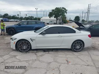 2018 BMW M4 with VIN WBS4Z9C5XJED22650, listed as a IAAI auction lot 42631888 with 41,266 mi miles and . Bid and sale history available at DreamBid. Image 14.